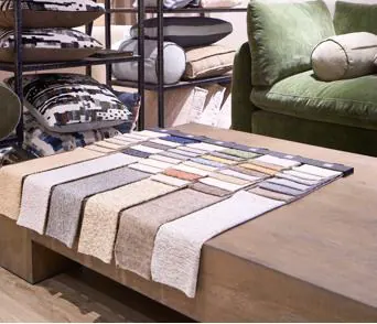 Fabric swatches on a showroom table